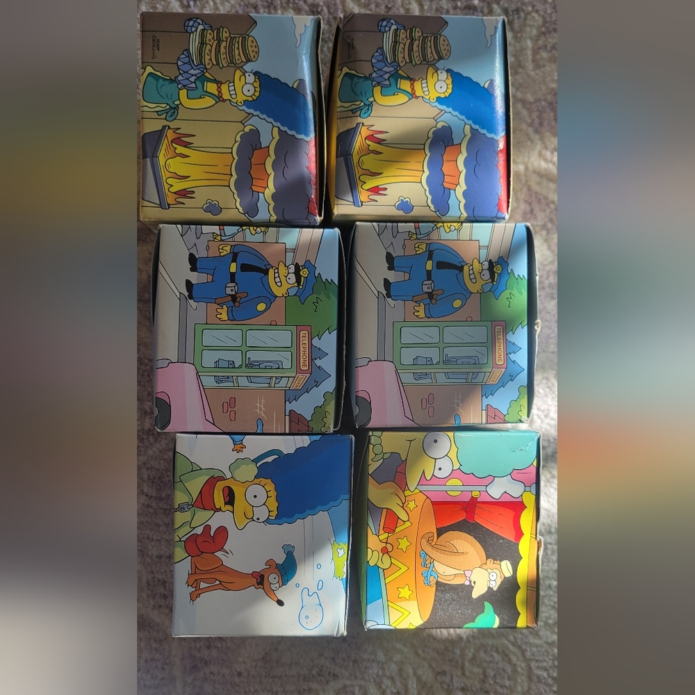 Homer & Bart Simpson talking watchs, in orginal boxes.